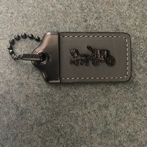 COACH 1941 glovetann hand tag